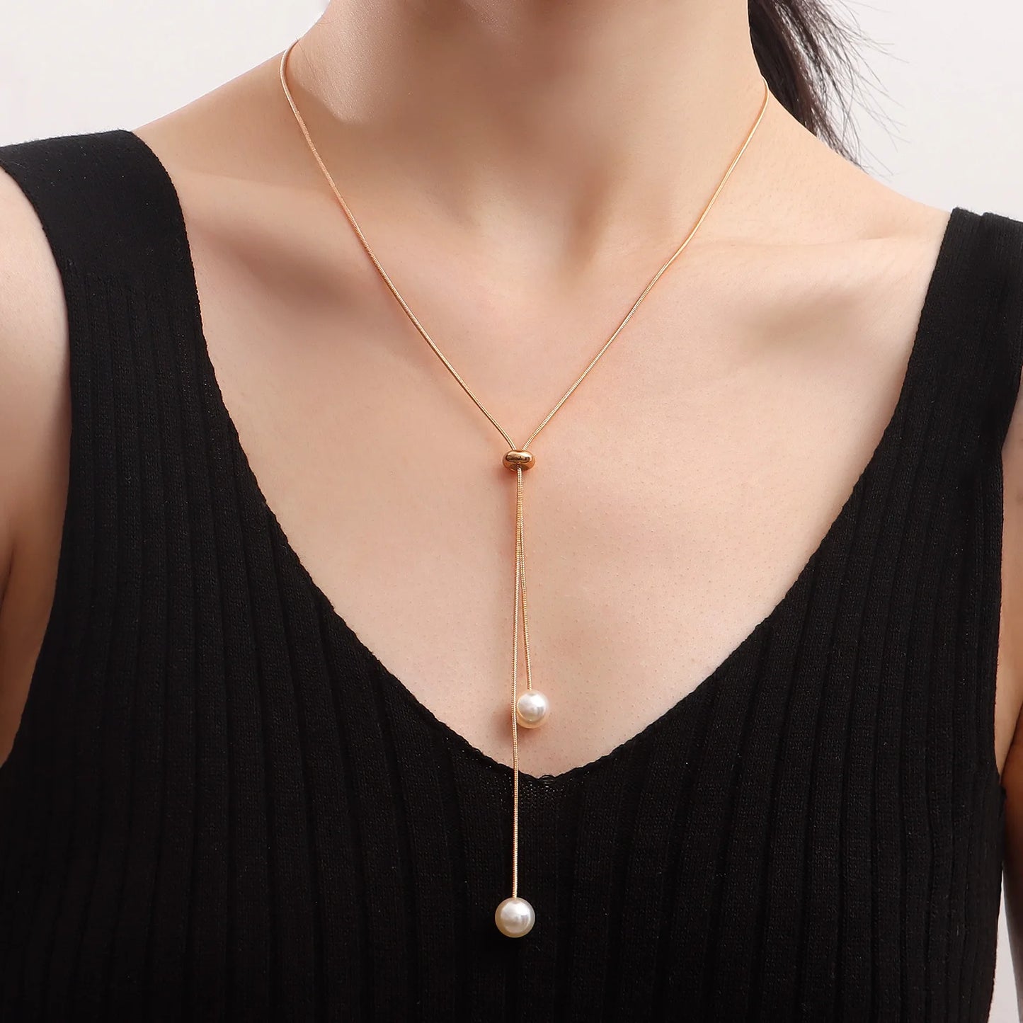 Elegant Gold Color Pearl Necklace with Tassel Design