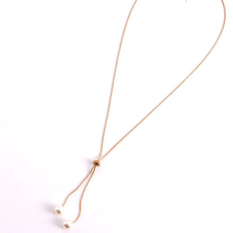Elegant Gold Color Pearl Necklace with Tassel Design